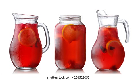 Collection of misted jugs with iced hibiscus lemon tea also known as agua fresca, karkade or red sorrel. Healthy eating,refreshment,detox