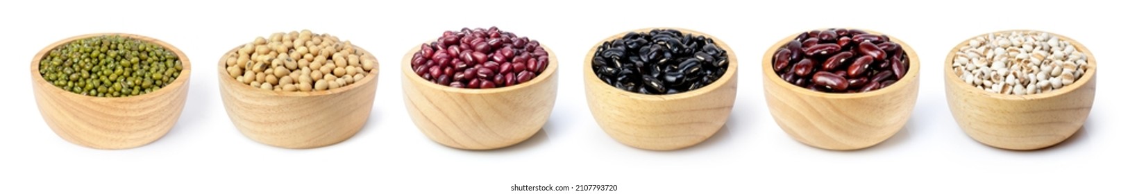 Collection of mix bean (red kidney, green mung, black bean, soy beans, adzuki and millet ) in wooden bowl isolated on white background. - Shutterstock ID 2107793720