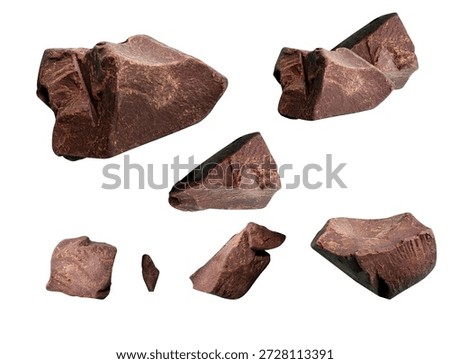 A collection of multiple distinct, broken pieces of dark chocolate, artfully arranged and seemingly suspended in mid-air against a stark white backdrop. This isolated studio photograph captures the raw, textured surface of the chocolate, highlighting its deep, inviting color and imperfections. Perfect for culinary blogs, recipe websites, advertising, or any project related to confectionery and indulgence.