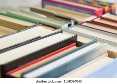 Collection of old books for reading and self-education in the library, close-up - Shutterstock ID 1558394048