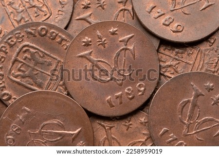 Collection old Dutch VOC coins from 1789 close up full frame as background