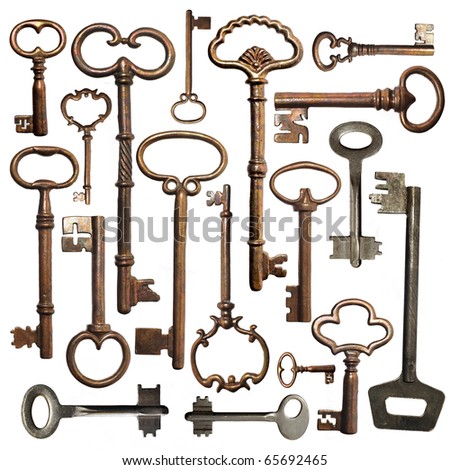 Collection of old keys on a white background