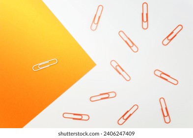 collection paper clips with only white one