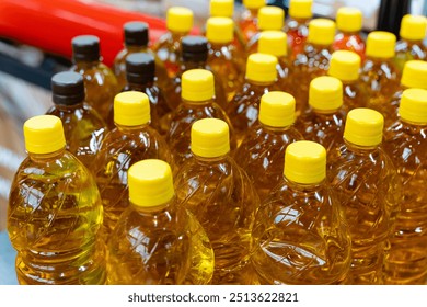 A collection of plastic bottles featuring bright yellow caps is neatly stacked on top of one another in an organized manner - Powered by Shutterstock