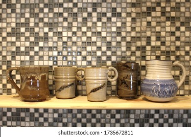 Collection Of Pottery Mugs And Pitcher