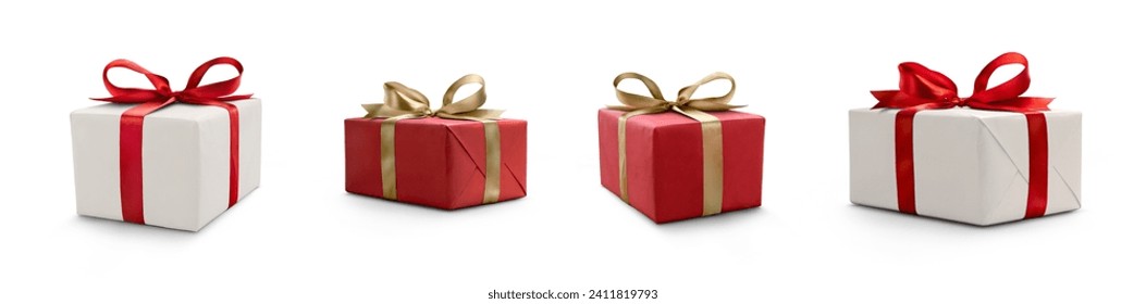 A collection of red and white gift wrapped presents with a red and gold ribbon bows isolated against a white background. - Powered by Shutterstock