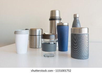 Collection Of Reusable Food And Drink Containers On White Table - Sustainability Concept (selective Focus)