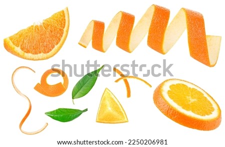 Collection of ripe juicy orange slices, leaves and zest isolated on a white background