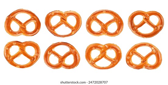 Collection of salted pretzels crackers isolated on a white background, top view. Bavarian beer snack.