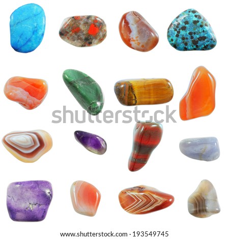 A collection of semi-precious stones against white background