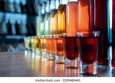 Collection Set Of Colored Alcohol Tincture Or Liquor With Shot Glass And Bottles