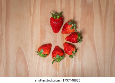 Collection Set Of Photos Of Strawberries In A Cirlce On Wooden Background For Stop Motion Video Clip. Juicy Fresh Vegan Strawberry