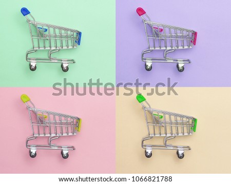 Collection of shopping cart  full of shopping time.Top view or flat lay composition cart on color background.