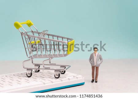 Collection of shopping cart  full of shopping time.Top view or flat lay composition cart on color background.online shopping concept.