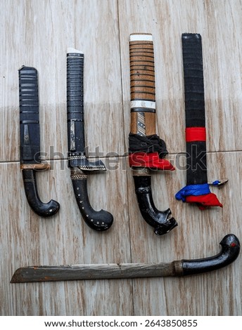 A collection of small machetes and sharp weapons used in the Debus performance.