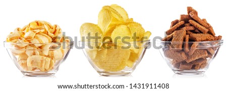 Collection of snacks for beer isolated on white background. Chips and crackers in a transparent plate. Set