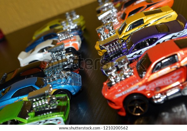Collection of toy cars, Hot Wheels\
with bokeh background. Hot Wheels is a scale die-cast toy cars by\
American toy maker Mattel - 2018 Curitiba-Pr\
Brazil