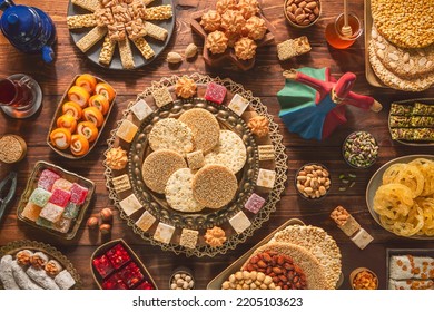 Collection of traditional Arabic sweets and candies to celebrate "Prophet Muhammad's Birthday Event". Varieties of Egyptian Mawlid Sweets or " Halawet Al Mawlid Al Nabawi". - Shutterstock ID 2205103623
