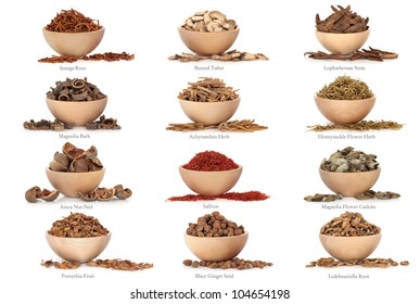 Collection Of Traditional Chinese Herbal Medicine In Beech Wood Bowls Isolated Over White Background.