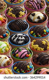 Collection Of Various Ice Cream, Vanilla, Chocolate, And Strawberry With Various Topping, Such As Cookie, Oreo, Chocolate Candy, Cereal With Caramel, Melon And Chocolate Topping