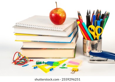 A collection of vibrant office supplies featuring a stapler, paper clips, books, binder clips, push pins, erasers, and rubber bands. Ideal for organizing workspace with a touch of color and creativity - Powered by Shutterstock