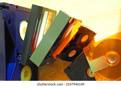 Collection of vintage media cartridges, including Betacam, 8mm data cartridge, VHS-C, MiniDisc, MiniDV