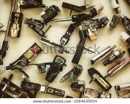 Collection of vintage record player stylus cartridges on a flee market