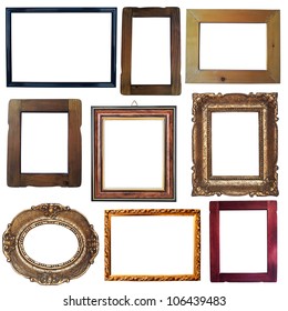 Collection of vintage wooden and golden empty frames isolated on white background