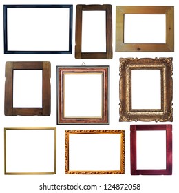 Collection of vintage wooden and golden empty frames isolated on white background