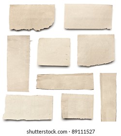 collection of  white ripped pieces of news paper on on white background. each one is shot separately
