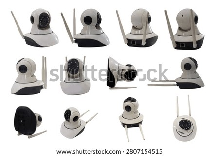 Collection of white wireless IP security cameras in multiple angles and views, featuring rotating design, antennas, and infrared lens. Isolated on white background for smart home security system, surveillance, and technology mockups.