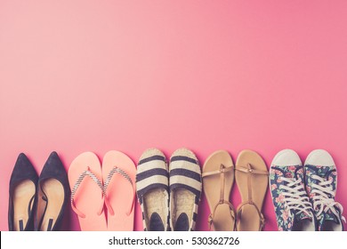 Collection Of Women's Shoes On Pink Background