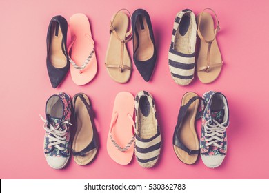 Collection Of Women's Shoes On Pink Background