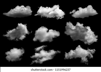 Collections Of Separate White Clouds On A Black Background Have Real Clouds. White Cloud Isolated On A Black Background Realistic Cloud. White Fluffy Cumulus Cloud Isolated Cutout On Black Background