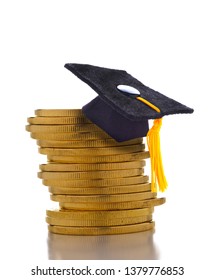 College Admissions Scandal: Mortarboard On A Stack Of Gold Coins Representing The High Cost Of Education, Student Loans And Bribery. 