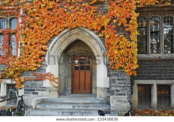College door with fall\
ivy