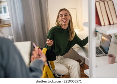 College Female Friends Talking In Dorm Room