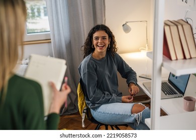 College Female Friends Talking In Dorm Room