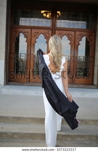 white jumpsuit graduation