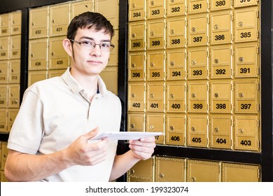 College student checking mail at mailboxed.