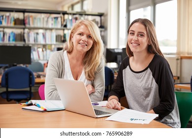 College Student Has Individual Tuition From Teacher In Library