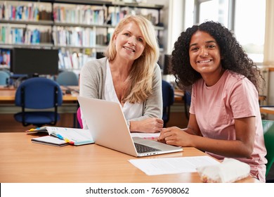 College Student Has Individual Tuition From Teacher In Library