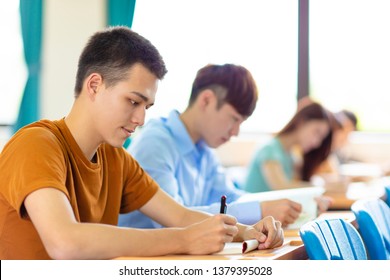  college student  studying in  classroom 