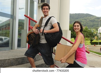 College Students Moving In To The University Campus