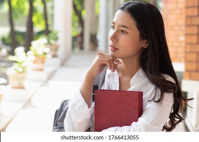 college woman student thinking, planning for her post gratuation future