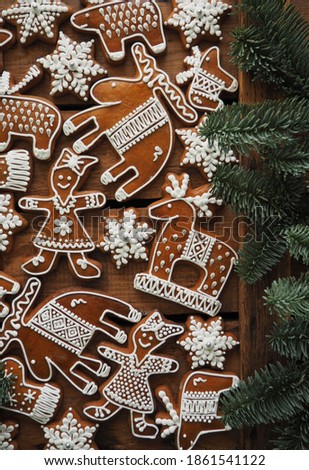 Collektion of Christmasgingerbread  cookies  on wooden background  Snowflakes, elk, reindeer, christmastree. Homemade delicious Flat lay, chritmas festive background. Xmas creative Greeting Card 