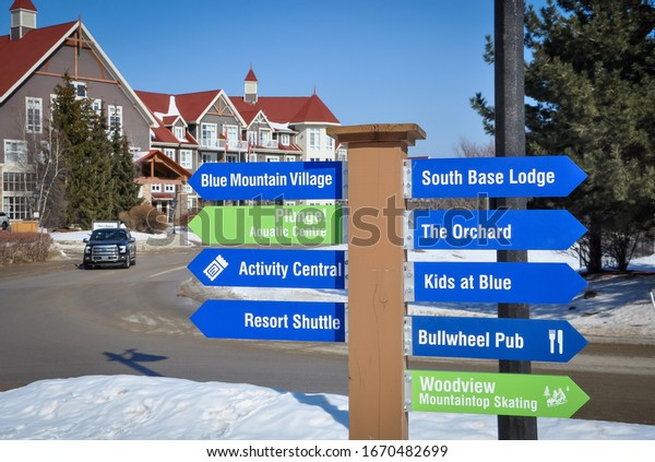 Collingwood, Ontario, Canada -\
February 23, 2020:  Directional signs inside the Blue Mountains\
Resort.  