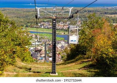 Collingwood, Ontario, Canada - October 4, 2019: Aerial view of Blue Mountain resort and village from the Open Air Gondola during the autumn in Collingwood, Ontario