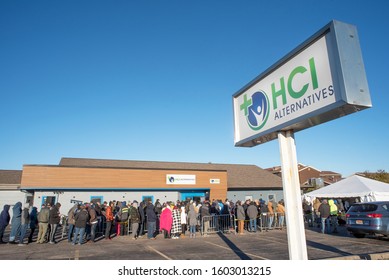 Collinsville, Illinois, USA, January 1, 2020 - Hundreds wait in line at HCI Alternatives marijuana dispensary to purchase pot legally for the first time in Illinois