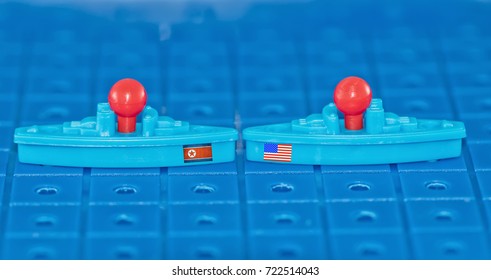 A Collision On A Toy Board Battleship North Korean And USA Warships With Missiles